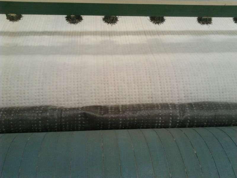 泰安宏源牌5800克天然纳基膨润土防水毯