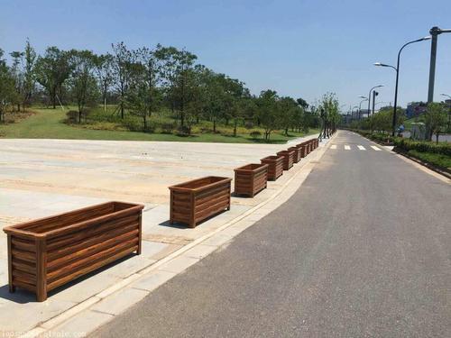 西安护栏隔离花箱定制厂家供应新型市政道路仿木纹花盆