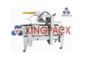 套膜收缩机，自动套膜收缩包装机www.xingpack.cn